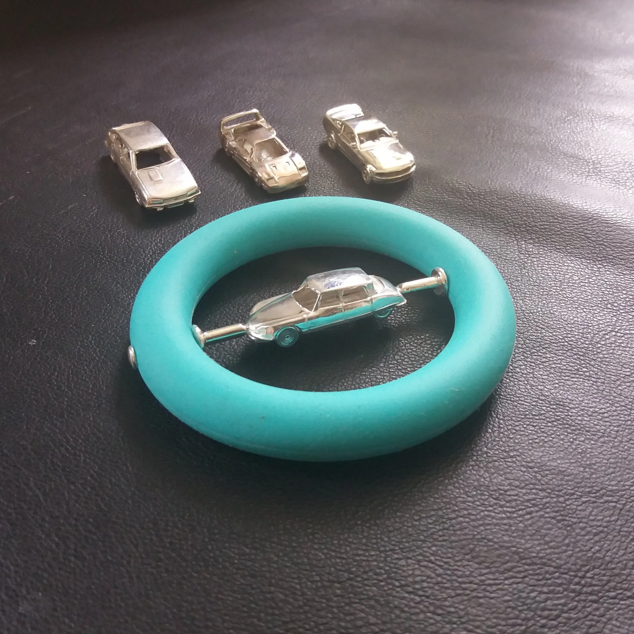 Baby teething ring with silver car