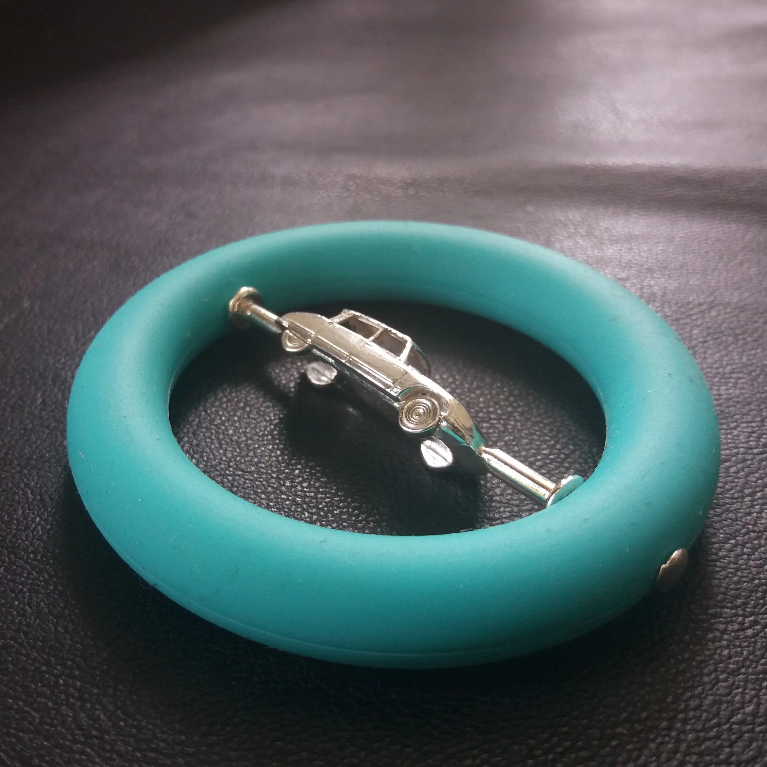 Baby teething ring with silver car